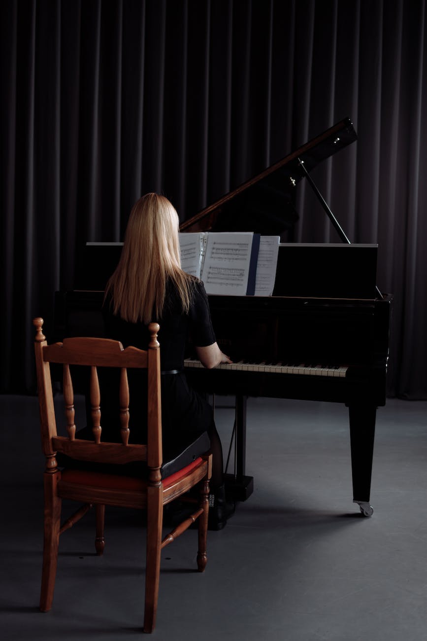 woman playing a piano